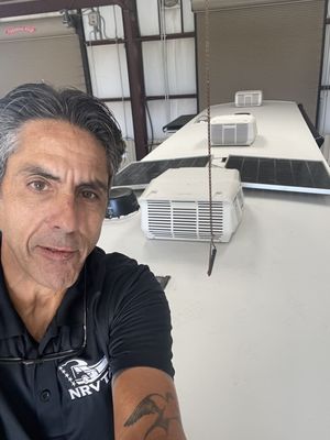 Tony performing a roof inspection